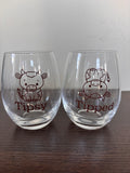 Tipsy or tipped stemless wine glass